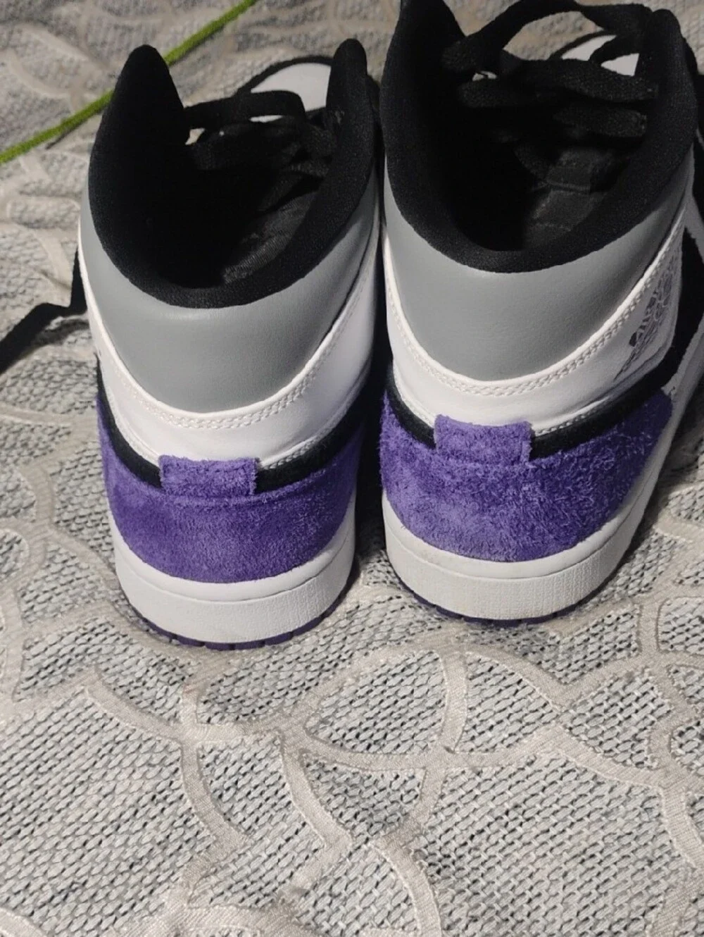 Nike Air Jordan 1 Mid Black White Purple Accent Sneakers